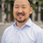 A headshot of Young Paik